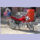 Motorrad mit rotem Plüschüberzug