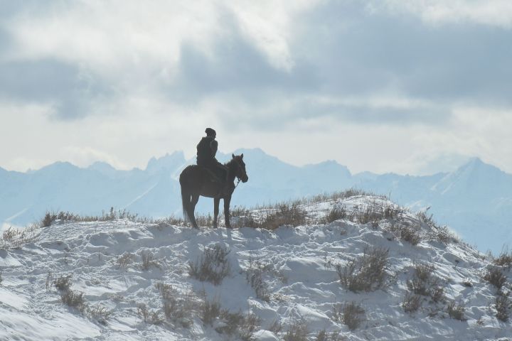 Reiter auf dem Kyzyl-Bel Pass